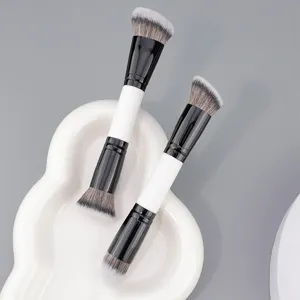 Professional double-ended makeup brush set with soft synthetic bristles for blending.