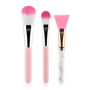 Kit de 3 pinceaux de maquillage avec pinceau poudre doux et masque en silicone marbré.