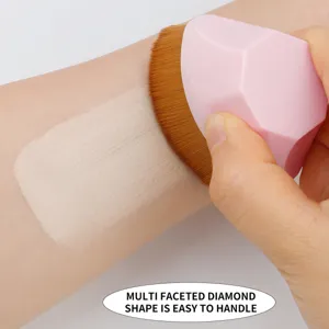 Diamond shape foundation brush with dense bristles for smooth liquid makeup application.