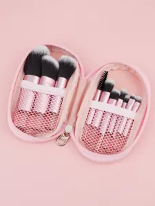 10-piece mini travel makeup brush set with pink portable zipper case for daily beauty.