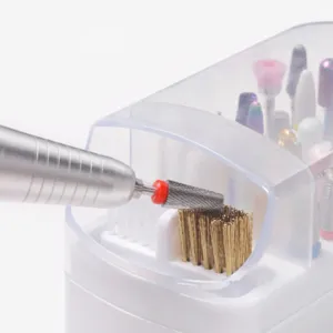 Detail view of 30-hole nail drill bit cleaning storage box with brush and dust cover.