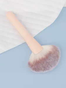 Professional large fan makeup brush with soft bristles and ergonomic handle for powder.