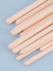 Detailed close-up view of skin-colored eye makeup brush set, premium quality handles.