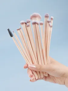 16-piece makeup brush set with beige handles and soft synthetic bristles for eye and face.