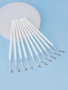 Set of fine angled eyeliner brushes with white handles and bent tips for precise makeup detail.