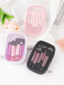 Set de brochas de maquillaje de malla portátil con estuche para viajes y uso diario.