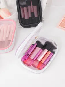 Set de brochas de maquillaje portátiles con estuche de malla y cremallera para viajes.