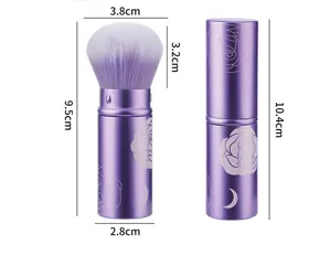 Portable retractable makeup brush with purple rose pattern, ideal for blush and powder.