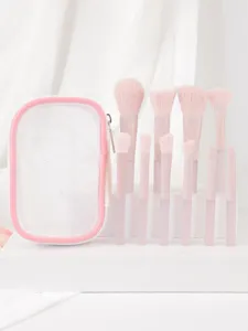 Set portatil de 10 brochas de maquillaje rosas con bolsa de malla para belleza diaria.