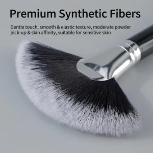 Large fan makeup brush with synthetic hair and silver ferrule for highlighting and dusting powder.