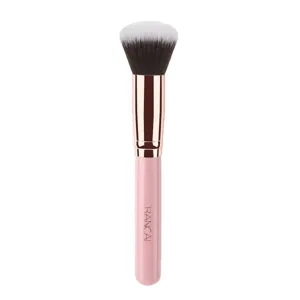 Professional pink handle makeup brush with soft bristles for powder and foundation application.