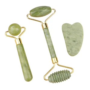 Natural green jade roller and gua sha set facial massager tool for skin care and relaxation.