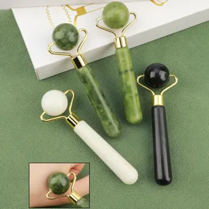 Jade roller facial massager set with multiple colors and gift box for skin care routines.