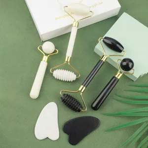 Jade roller and gua sha set facial massage tools anti aging skin care kit gift box.