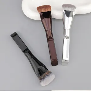 Detailed view of the flat foundation makeup brush, highlighting soft bristles and smooth handle.