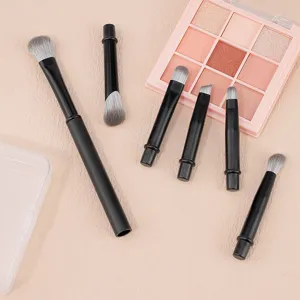 Portable mini travel makeup brush set with detachable replacement brush heads for easy daily use.