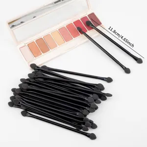 Portable double-ended sponge eyeshadow brushes with sleek black handles, ideal for precise makeup.