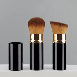 Portable retractable makeup brush set in black gold with loose powder brushes main view