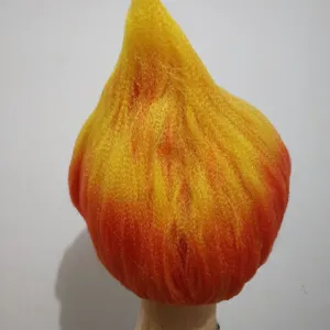 Close-up detail of the fluffy flame cosplay wig, vibrant yellow and orange gradient synthetic hair.