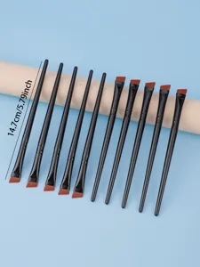 Professional angled eyeliner brush set with 10 pieces, fine fiber hair for precise eye makeup.