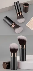 Portable retractable makeup brush with soft dual-tone bristles and sleek rose gold finish.