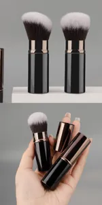 Portable retractable makeup brush with soft bristles and metal case for travel daily use.
