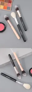Professional soft flame makeup brush for powder and blush, precision highlighting tool.