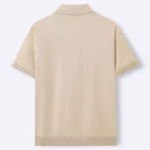 Back detail view of a classic beige short sleeve knit polo shirt for men, fine knit texture.