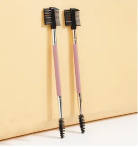 Dual-ended eyelash brush and eyebrow comb detail, portable makeup tool with wooden handle.