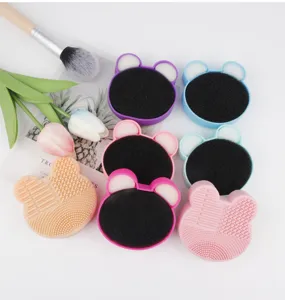 Silicone brush cleaner mat with sponge insert for makeup tools detail view and colors.