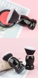 Large round makeup brush, soft synthetic fiber powder brush, black handle cosmetic tool.