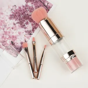 Vue détaillée du kit de pinceaux de maquillage 5 en 1 portable avec poils roses et boîtier or rose.