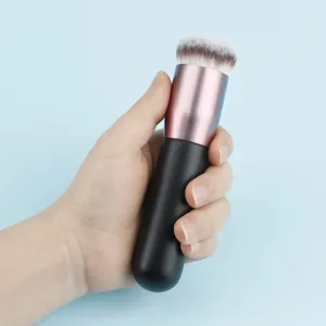 Professional flat top foundation brush with soft dense bristles for smooth makeup application.