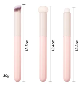 Pink makeup brush set with concealer brush and lip brush, featuring precise size guides.