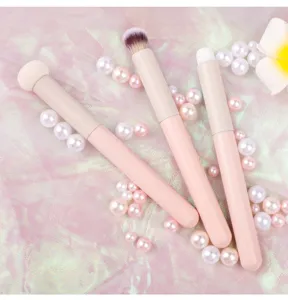 Pink handle makeup brush set with pearl decor, soft bristles for concealer and lip makeup.