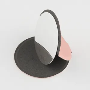 Portable folding makeup mirror with stainless steel surface and stable desktop stand base.