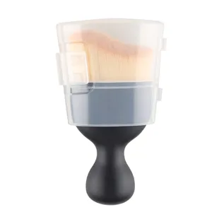 Curved wave foundation brush detail, ergonomic black handle with clear protective cover.