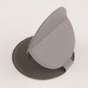 Close up detail of portable folding pocket mirror with grey leather stand, compact and sleek.