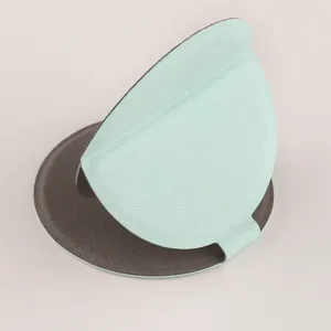 Portable folding cosmetic mirror with mint green leather cover, ideal for desktop makeup use.