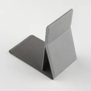 Detail view of the grey folding makeup mirror stand, showing the portable PU leather texture.