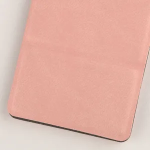 Detail shot of the pink textured folding makeup mirror cover showcasing its fine craftsmanship.