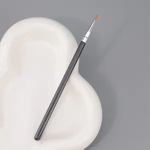 Fine eyeliner brush with black handle and slim tip for precise makeup and detailed lines.