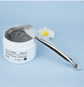 Masque de boue nettoyant en profondeur avec pinceau double embout silicone vue détaillée.