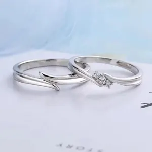 Bagues de couple argent design ruban de Mobius ouvert avec diamants brillants bijoux