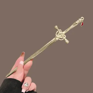 Gold sword hair stick for women, vintage metal hairpin for Hanfu and buns, stylish hair accessory.