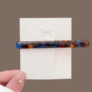 Acetate small baguette hair clip for women, stylish tortoiseshell barrette side hair accessory.
