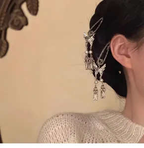 Retro rhinestones butterfly tassel hair clip detail shot, elegant Chinese style side duckbill clip.