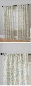Botanical print linen curtain with tassel trim, pastoral style home window decor detail.