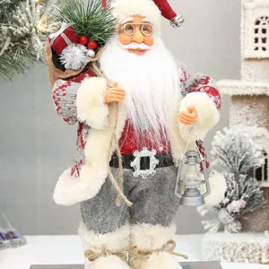 12 inch staande Kerstman pop met cadeautas en lantaarn voor kerstdecoratie detailweergave.