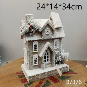 Kerstdecoratie sneeuw houten huis verlicht tafelornament voor feestelijke inrichting